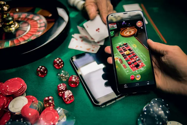 A person using their device against a moody casino-themed background, illustrating the smooth re-entry process at AMJILI.